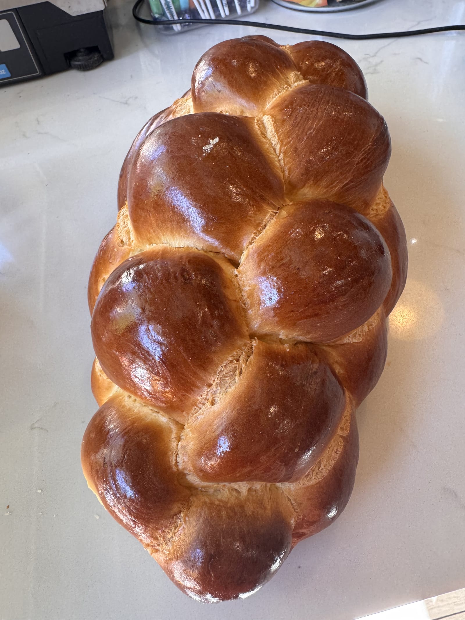 A shiny braided challah
