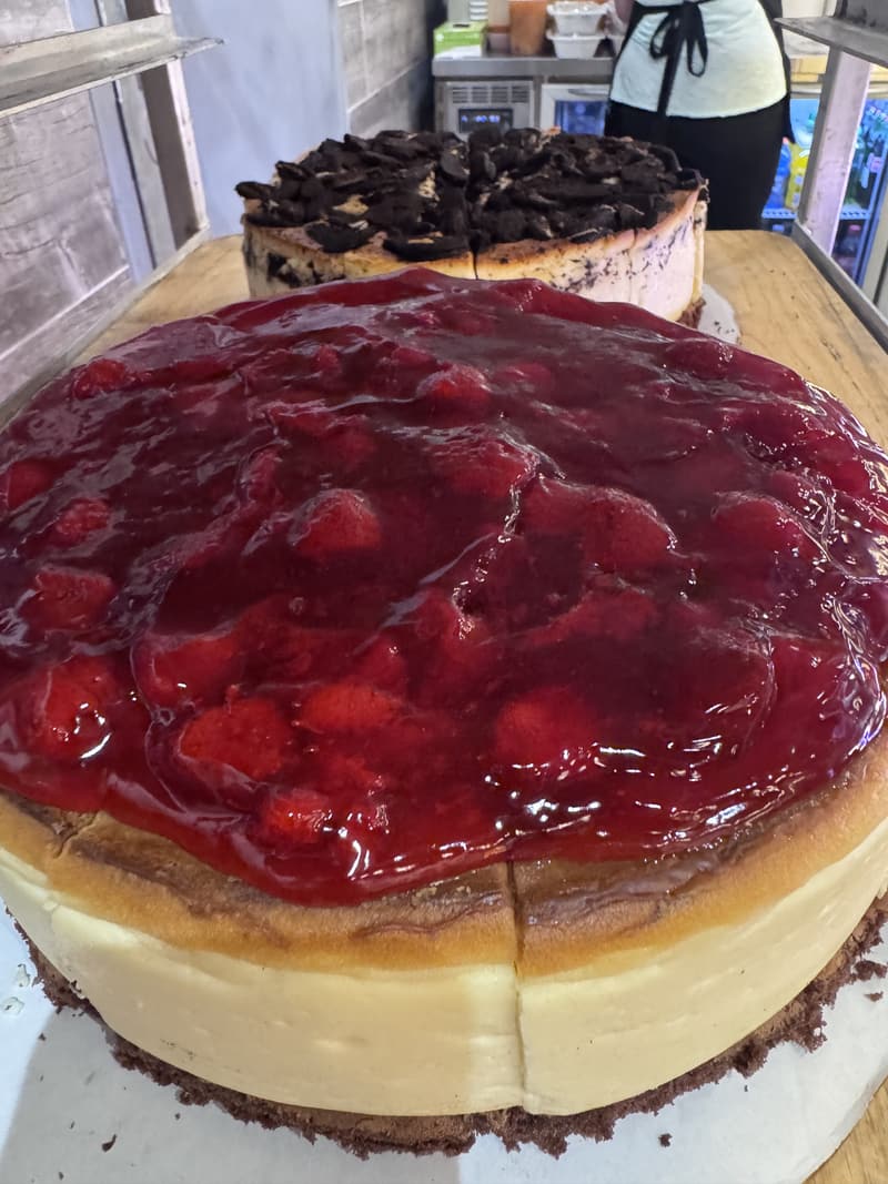 Cheesecake with a glossy strawberry topping