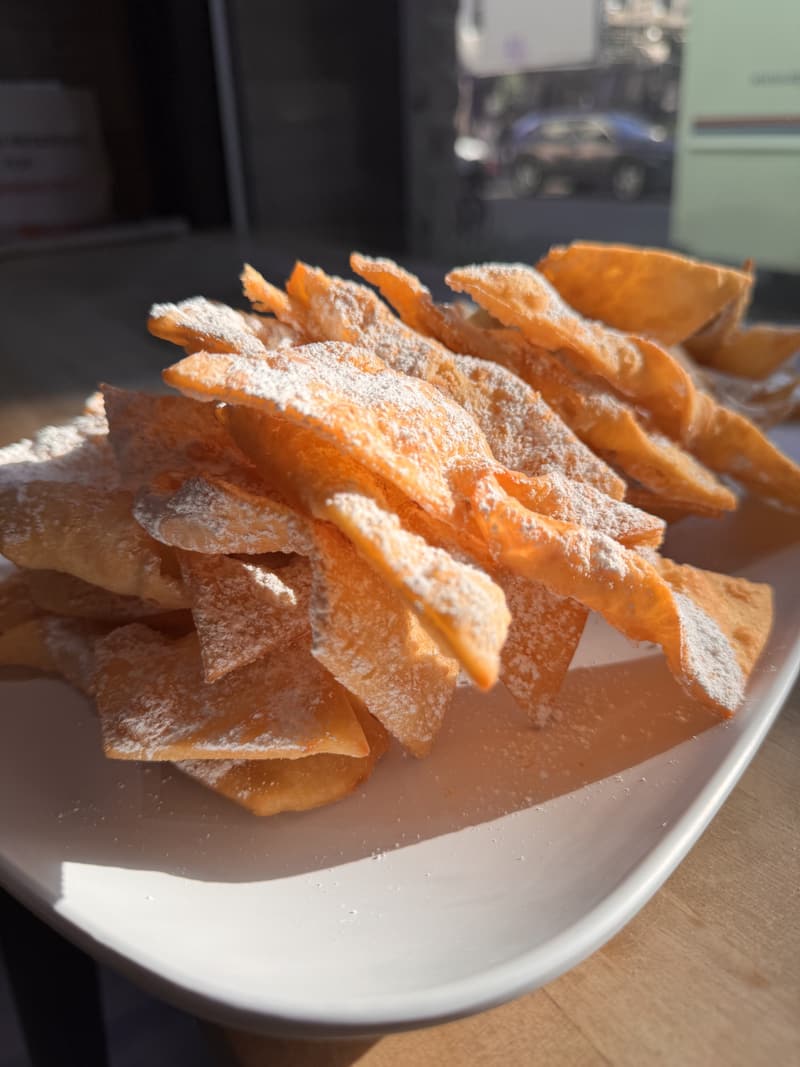 Chruściki dusted with powdered sugar