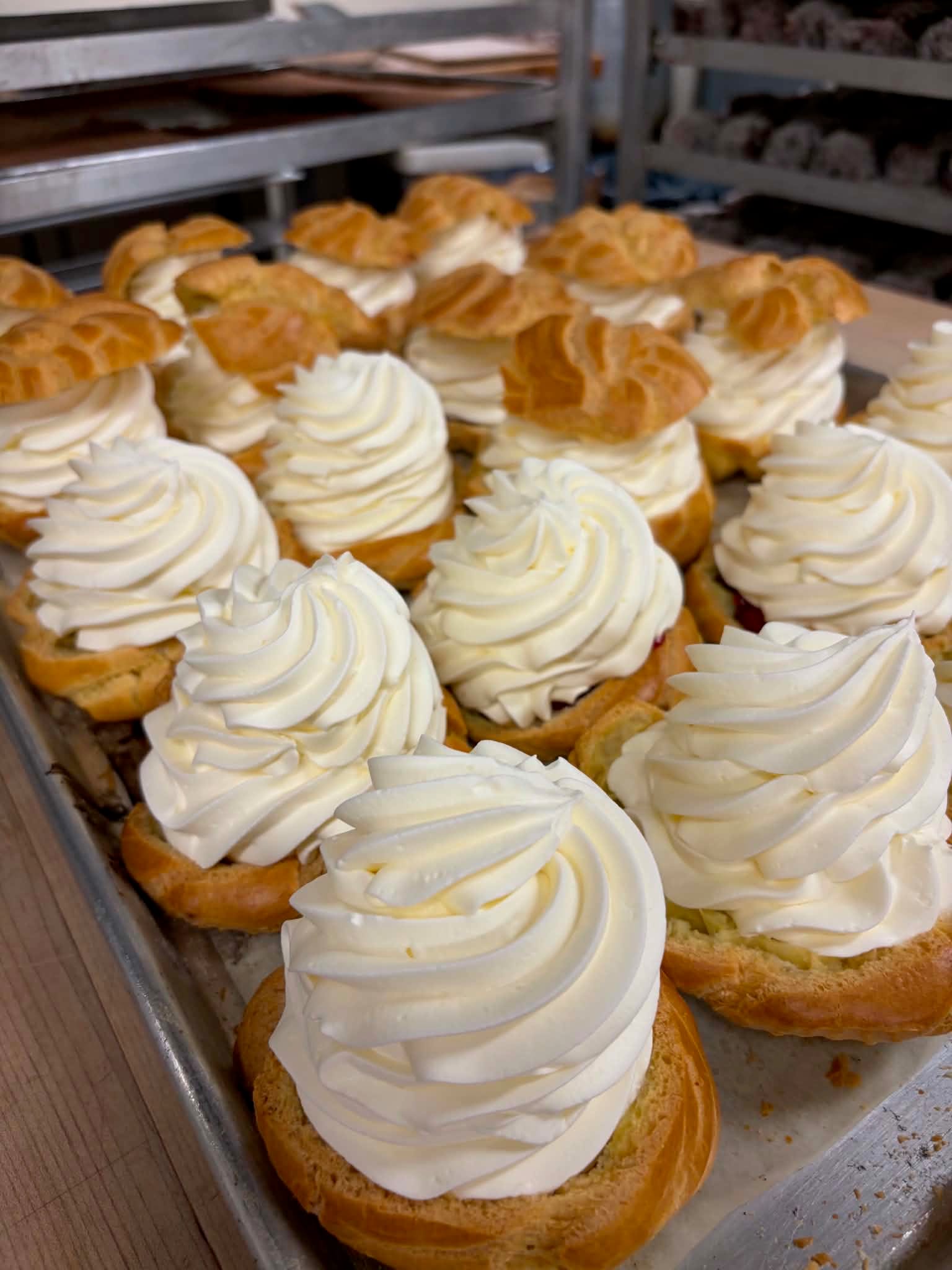 Cream puffs piled high with whipped cream