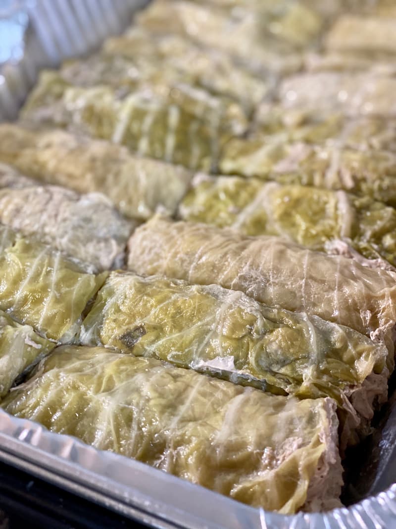 A tray of gołąbki, stuffed cabbage rolls