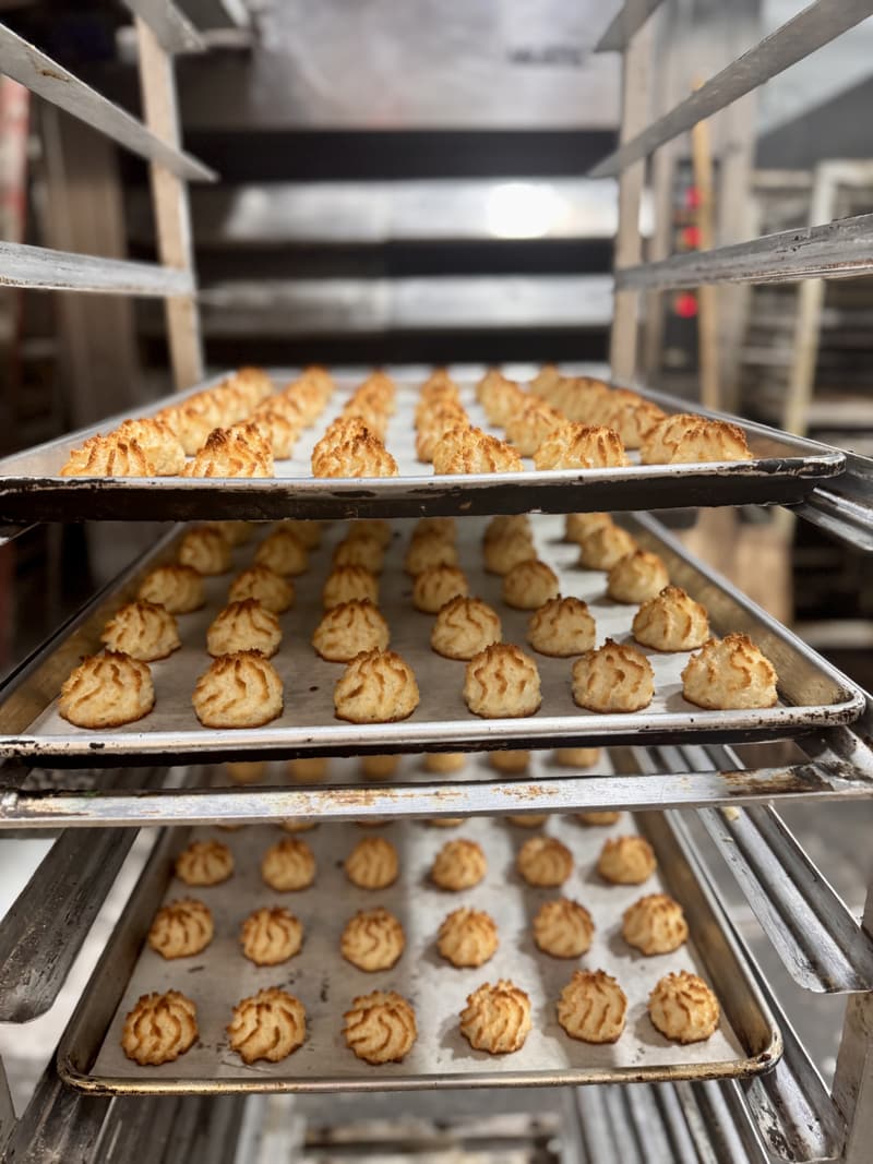 Baking trays filled with coconut macaroons