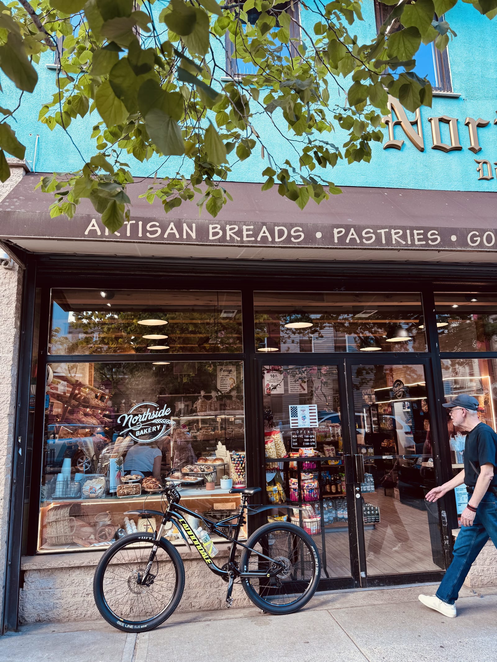 Northside Bakery entrance with the pastry case visible through the windows